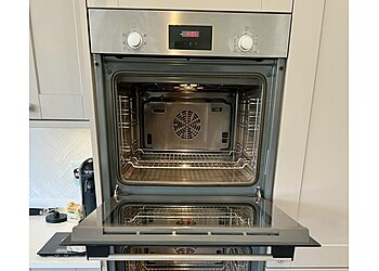 Grubby Mitts Oven Cleaning