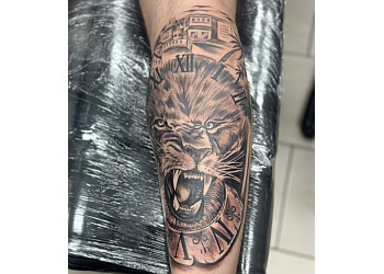 Lion Tattoo and Piercings Studio