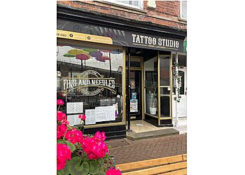 Pins & Needles Tattoo