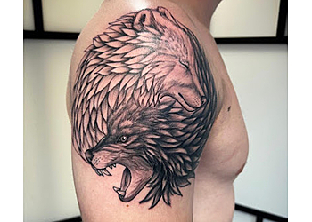 Rude Studios Tattoos & Piercings