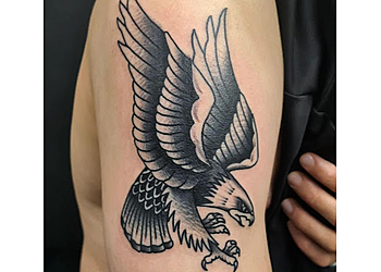 Rude Studios Tattoos & Piercings